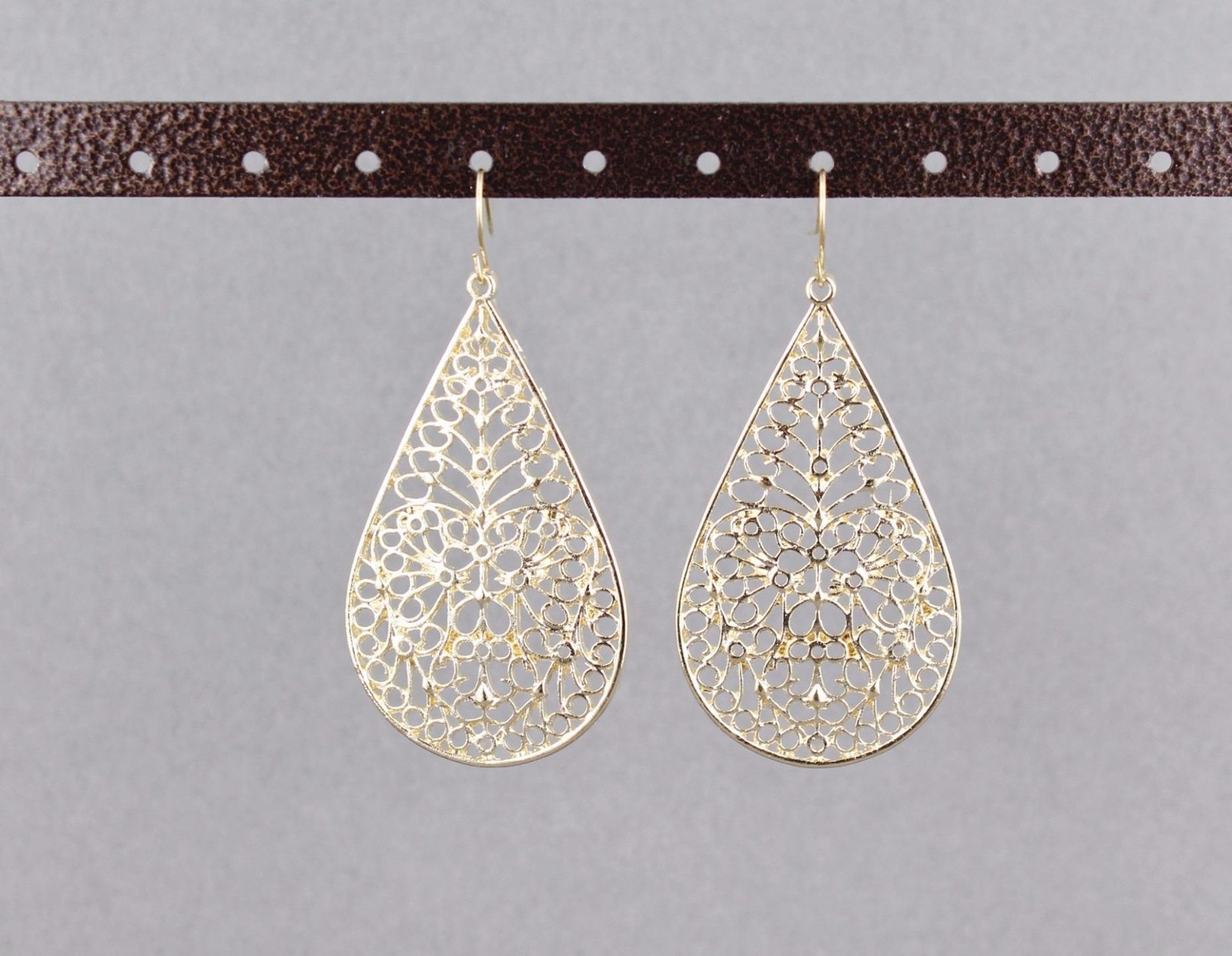 Gold teardrop earrings dangle cut out filigree scroll oval 2.5