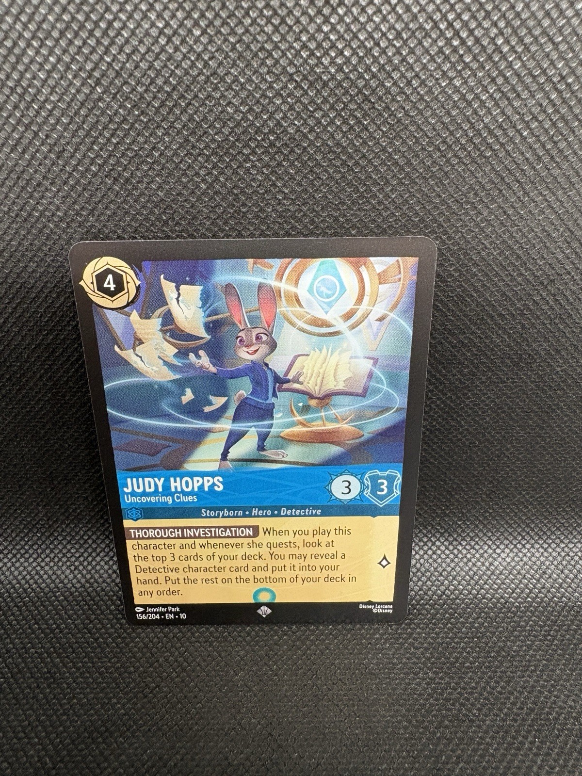 Lorcana Whispers Judy Hopps Uncovering Clues 156/204 ERROR BLUE(01)