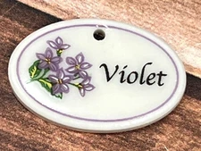 Longaberger Ceramic Basket Tie-On Accessory With VIOLET Design 23905