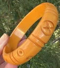 Bakelite vintage orange carved bangle bracelet Tested jewelry