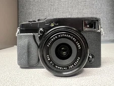 Black Fuji X-Pro1 with Fujinon 18mm f2, 52mm Fujinon 35mm f1.4, 52mm used.