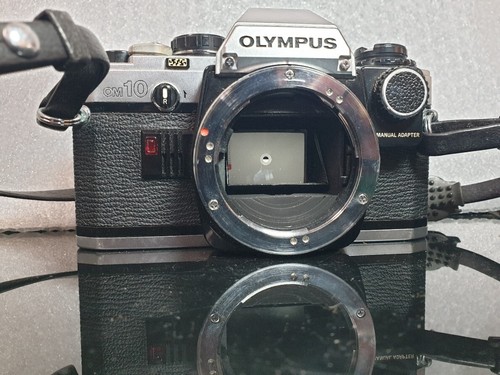 Olympus OM10 SLR Vintage Film Camera con ZUIKO AUTO S 50mm-teleplus-Kenko - Imagen 18 de 24