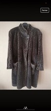 Manteau imitation Léopard très bon état 
