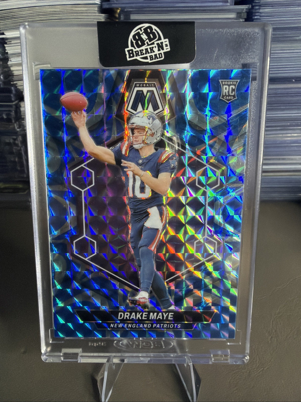 2024 Panini Mosaic - Rookies Drake Maye #303 Reactive Blue Mosaic Prizm (RC)