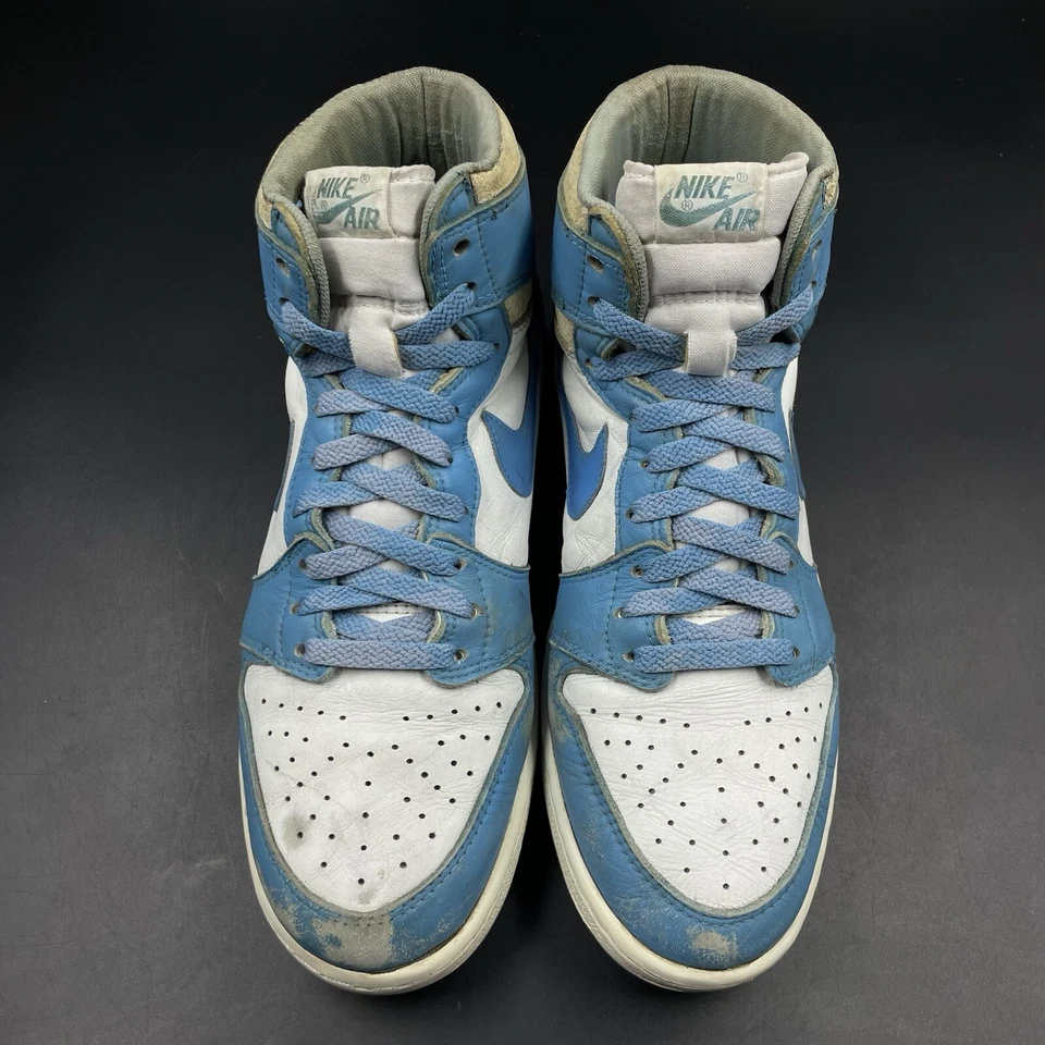 Talla 11 Nike Air Jordan 1 High 1985 UNC Powder Blue Carolina OG Foto 2 de 4