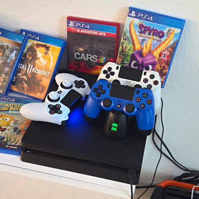 Sony PlayStation 4 PS4 Slim Console Bundle, 3 Controllers, 12 Games, Dock Charge