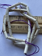 10x4mm white tube wampum quahog beads 16  strand. About 39 beads.