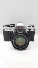 Canon AE-1 35mm SLR Film Camera w/ Continental MC 1:2.8 28mm auto Lens Untested