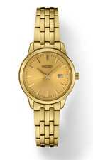 Seiko Essentials All Gold Tone Champagne Steel Women's SUR444 Watch w/ Date