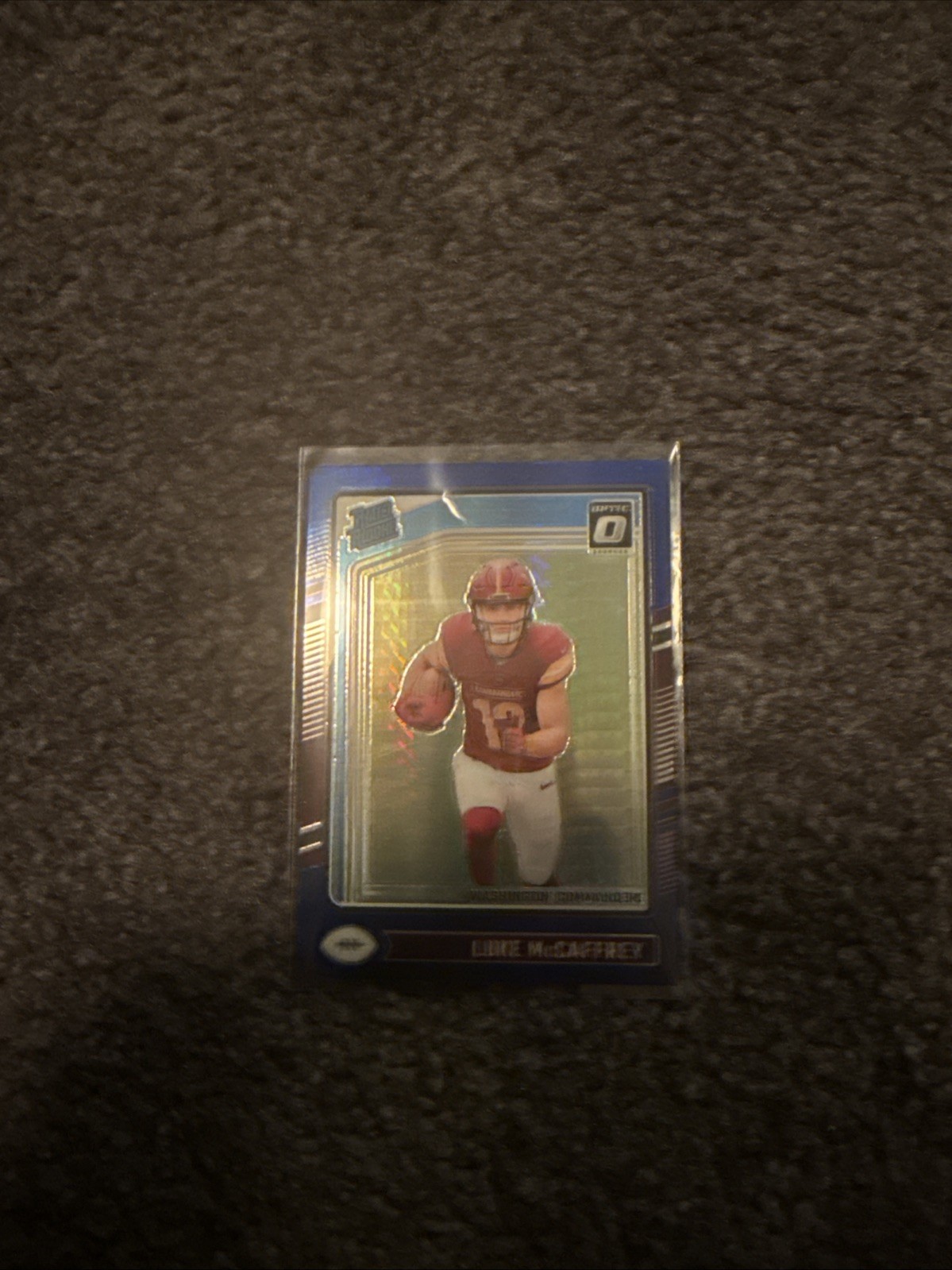 2024 Panini Donruss Optic Rated Rookie Luke McCaffrey #268 Blue Scope Prizm (RC)