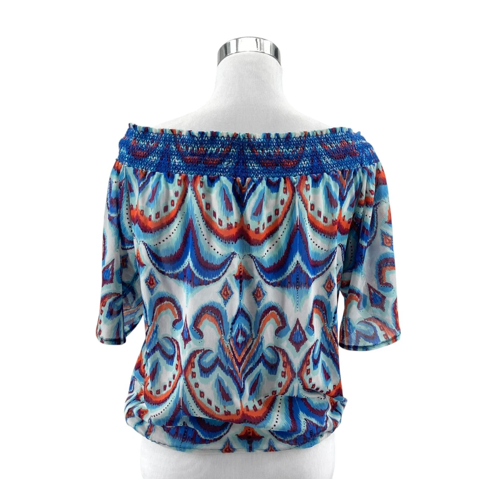 Blusa top bebe para mujer azul medio estampado geográfico manga abertura calada al hombro Foto 2 de 4