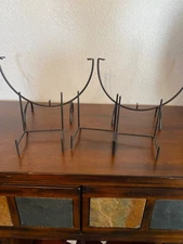 Black metal display stands. 5
