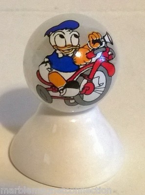 BABY DON ALD DU CK ON BIKE ON WHITE PEARL MARBLE