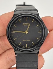 Casio Quartz 1330 MQ-24 Black Gold Tones Watch 8.20