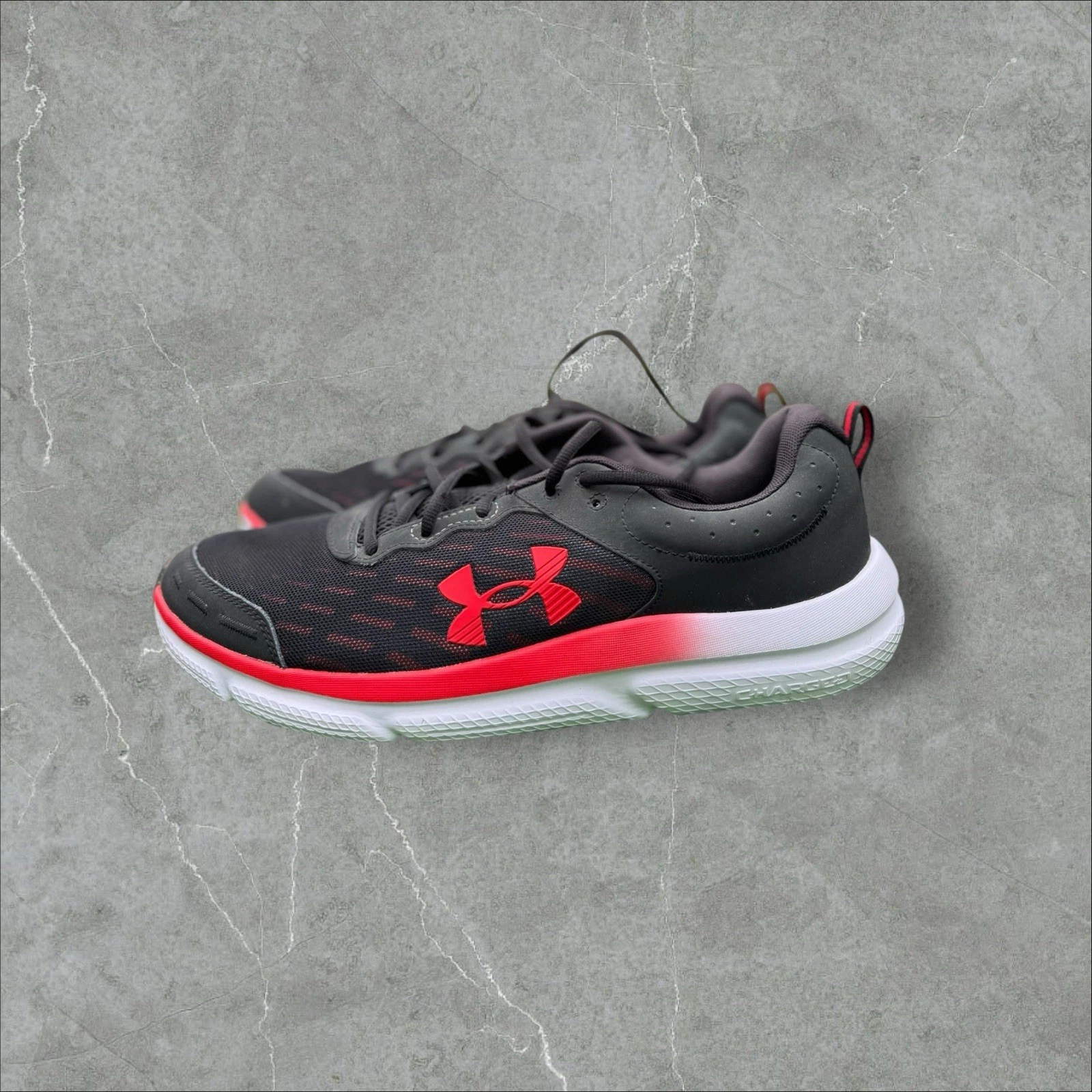 Scarpe da corsa Under Armour 3026175 uomo Charged Assert 10 nero rosso taglia 12 5