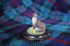Pre-owned Country Artists Figure of an otter.