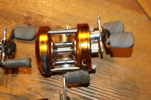 3 Bass Pro Shops Mega Cast Metal Round Baitcast Reel MCM1000 & MCM2000 - Picture 3 of 6