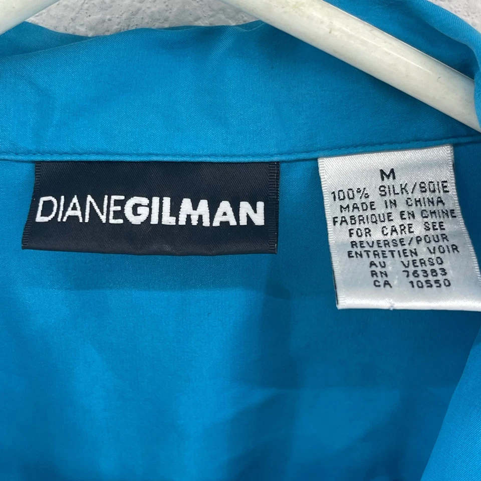 Camisa Diane Gilman Seda Abotonada Azul Manga Larga Bolsillo Mediana Foto 2 de 4