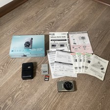 Canon PowerShot SD750 Digital ELPH 7.1 MP Cam...