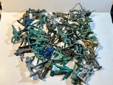 Lot of assorted VTG plastic play Army figures as shown. Some missing parts.