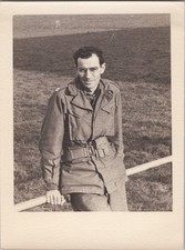 WW2 Photo of US Soldier Sitting On Rail At Muenchen Gladbach Germany