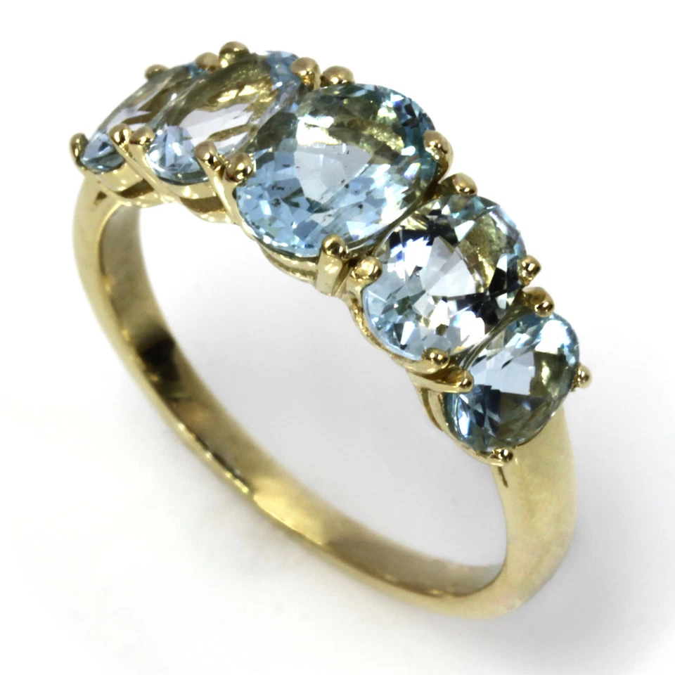 Anillo graduado de cinco piedras de oro amarillo sólido de 14 k aguamarina azul natural de 3 quilates Foto 2 de 4