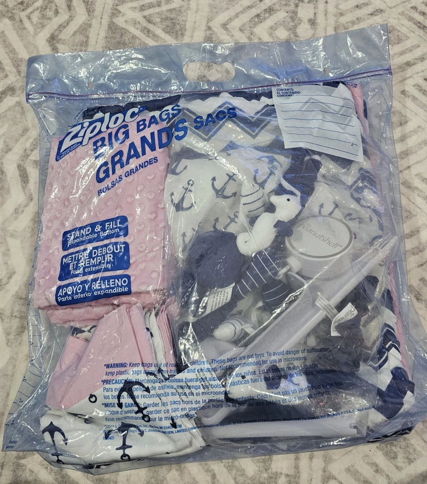 Juego de ropa de cama para cuna náutica The Peanut Shell rosa y azul Foto 2 de 4