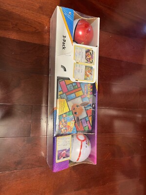 Pokemon Eevee Evolutions 3-Pack Treasure Chest Tin & 2 PokeBalls - Costco 