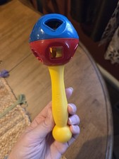 Vintage TUPPERWARE TUPPERTOY RATTLE /Shape O Sorter Ball/Yellow Blue Red
