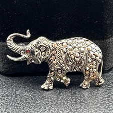 Broche elefante plateado 835 vintage con marcasita y ojos rojos, tronco