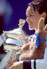 Martina Hingis of Switzerland poses with the trophy after defeatin- Old Photo 3