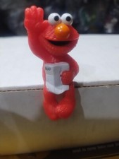 Vintage Sesame Street Elmo Figure Sitting With Map  Waving