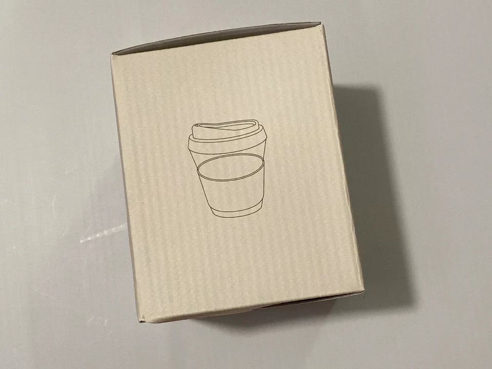 Taza de café de vidrio reutilizable de 12 oz. Taza de vidrio templado y banda de silicona antideslizante. Foto 2 de 3