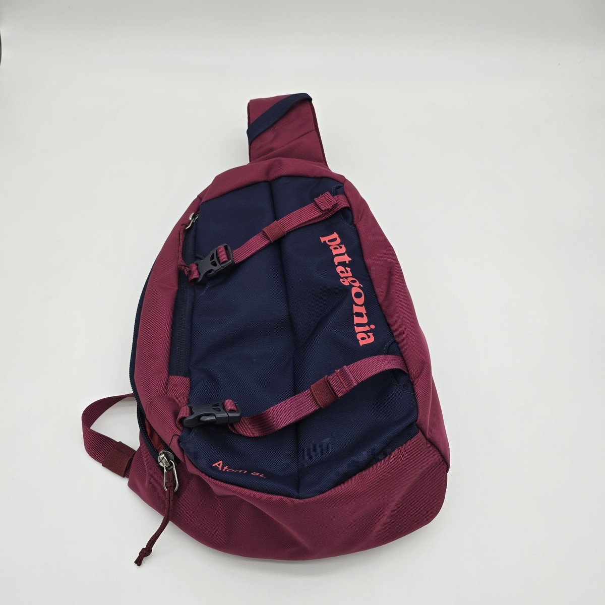 crossbody sling bag patagonia Atom 8L The Atoms teardrop shape keeps the pack right behind your shoulders where it stays out of the way when youre moving through crowded streets and subway terminals Shoulder Bags Patagonia Women's Sling