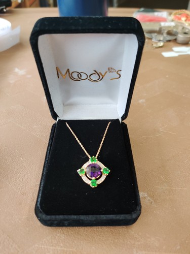 14kt. gold Amethyst pendant