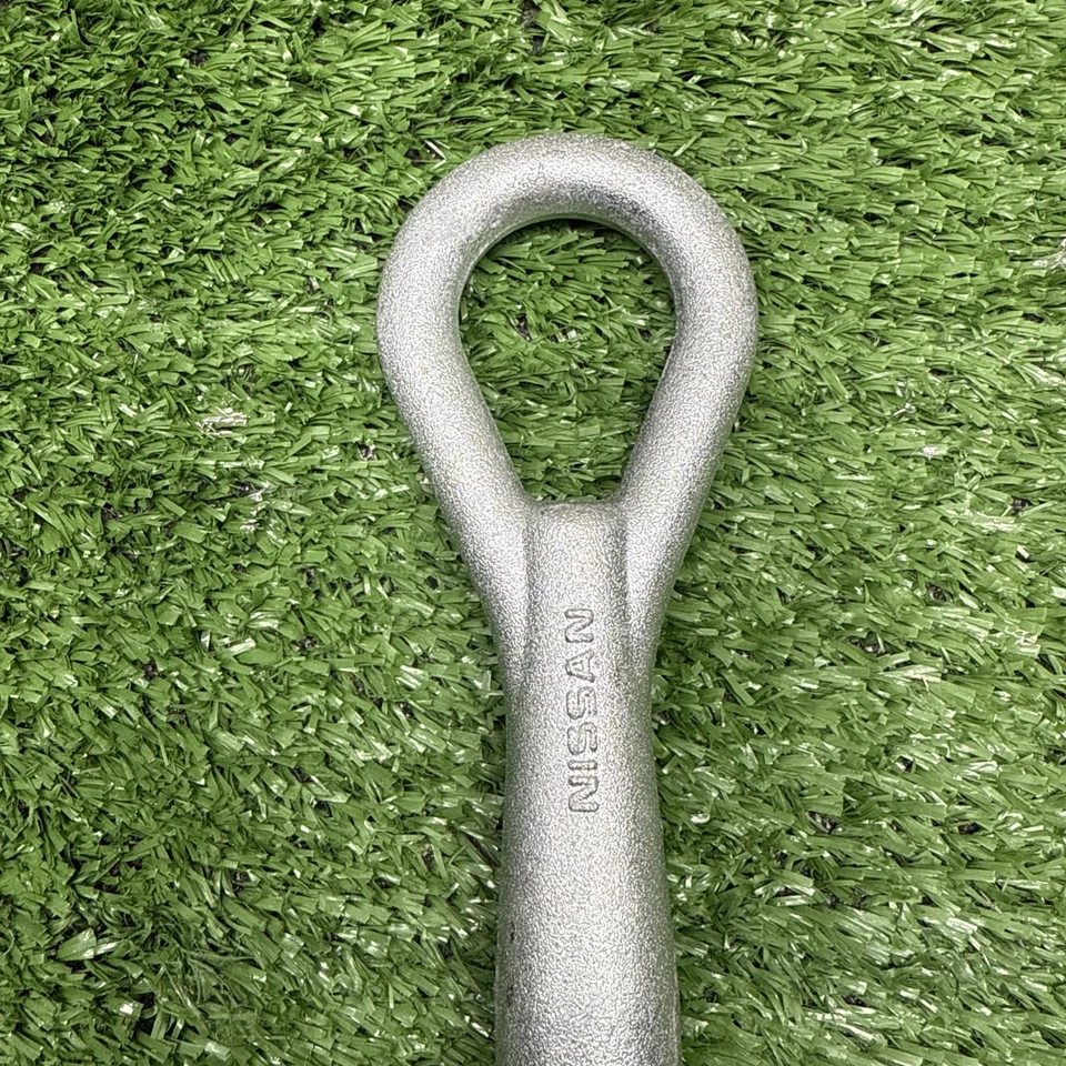 Gancho de remolque de fábrica Nissan Infiniti OEM G35 51112-1JA0A Foto 3 de 4