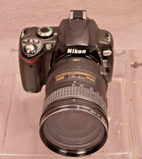 Nikon D40x with 18-200mm f3.5-5.6 G II ED DX lens plus bag, filter, and Flash