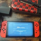 Nintendo Switch OLED Mario Red Edition with Nintendo 64GB & 32SD card + Case