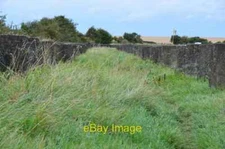 Photo 6x4 Anti-tank structures near the Lindisfarne Causeway Beal Rows of c2014