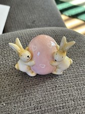 Celebrate spring with this charming ceramic pink egg and rabbit, the glazed