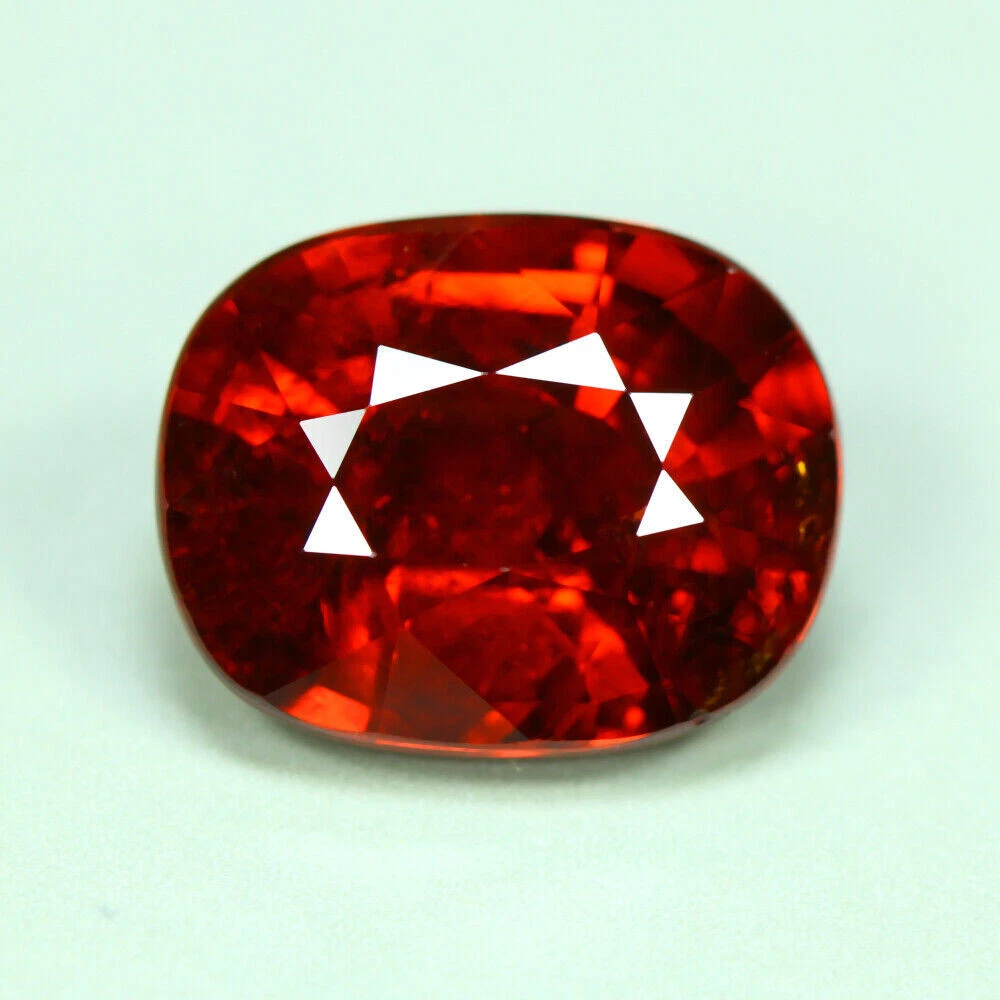 Pierre Grenat Espesartite Naturelle 0.86ct - Ovale 6.5x5.2mm, Orange, Namibie, Non Traitée
