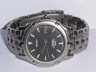 VINTAGE SEIKO 7N32-0069 TITANIUM QUARTZ WRISTWATCH WITH DATE. WORKING.