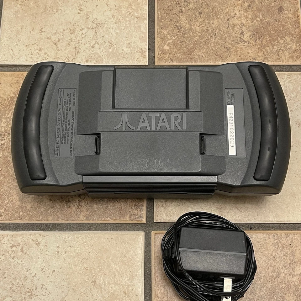 Sistema portátil Atari Lynx II PAG-0401 con cubierta de batería + cable de alimentación FUNCIONAMIENTO PROBADO Foto 4 de 4