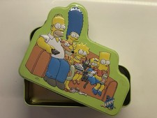 Official Simpsons Biscuit (Donut) Tin — Cutout, Embossed & Retro (2003). Empty.