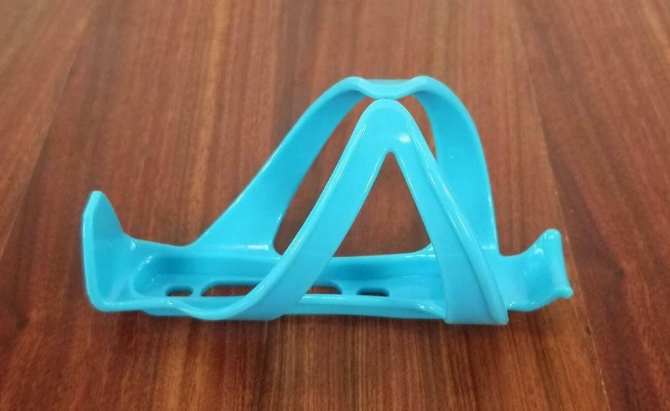 CLEAN MOTION CBC-07 BABY BLUE COMP. BICYCLE WATER BOTTLE CAGE Foto 4 de 4