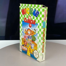 Juego Nintendo NES KICKLE CUBICLE con embalaje e instrucciones