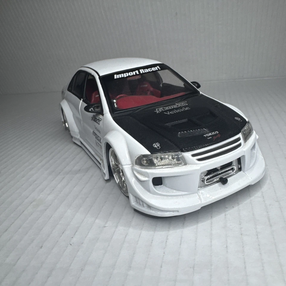 ИМПОРТНЫЙ ГОНОЧНЫЙ АВТОМОБИЛЬ MITSUBISHI LANCER EVOLUTION VI 6 1:24 БЕЛЫЙ - Изображение 2 из 4