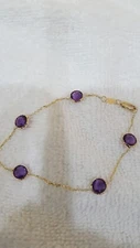 14k Yellow Gold Bracelet 7+ with Amethyst 6mm round checkabord both side. Lobste