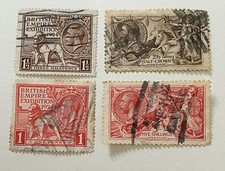 FOUR KING GEORGE V STAMPS SEA HORSES AND BRITISH EMPIRE