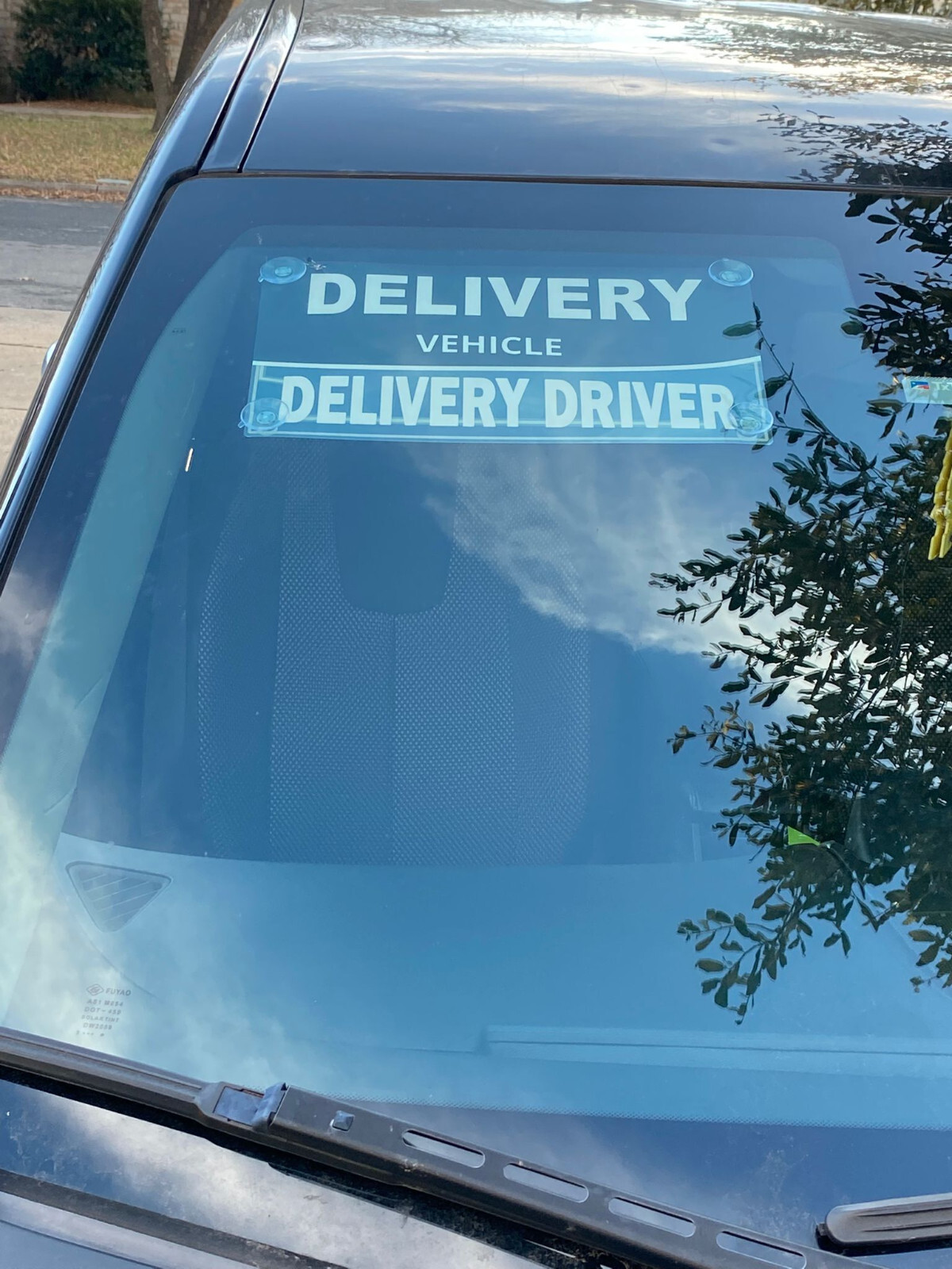 delivery driver car sign